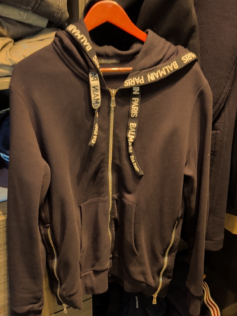 Balmain Black Hoodie with White Branded Drawstrings and Gold Zip